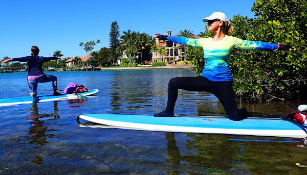 Why an inflatable paddle board for yoga and fitness