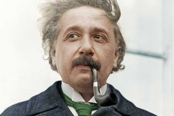 Albert Einstein wearing a suit and tie