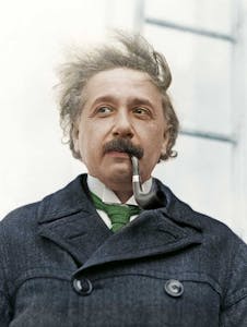 Albert Einstein wearing a suit and tie