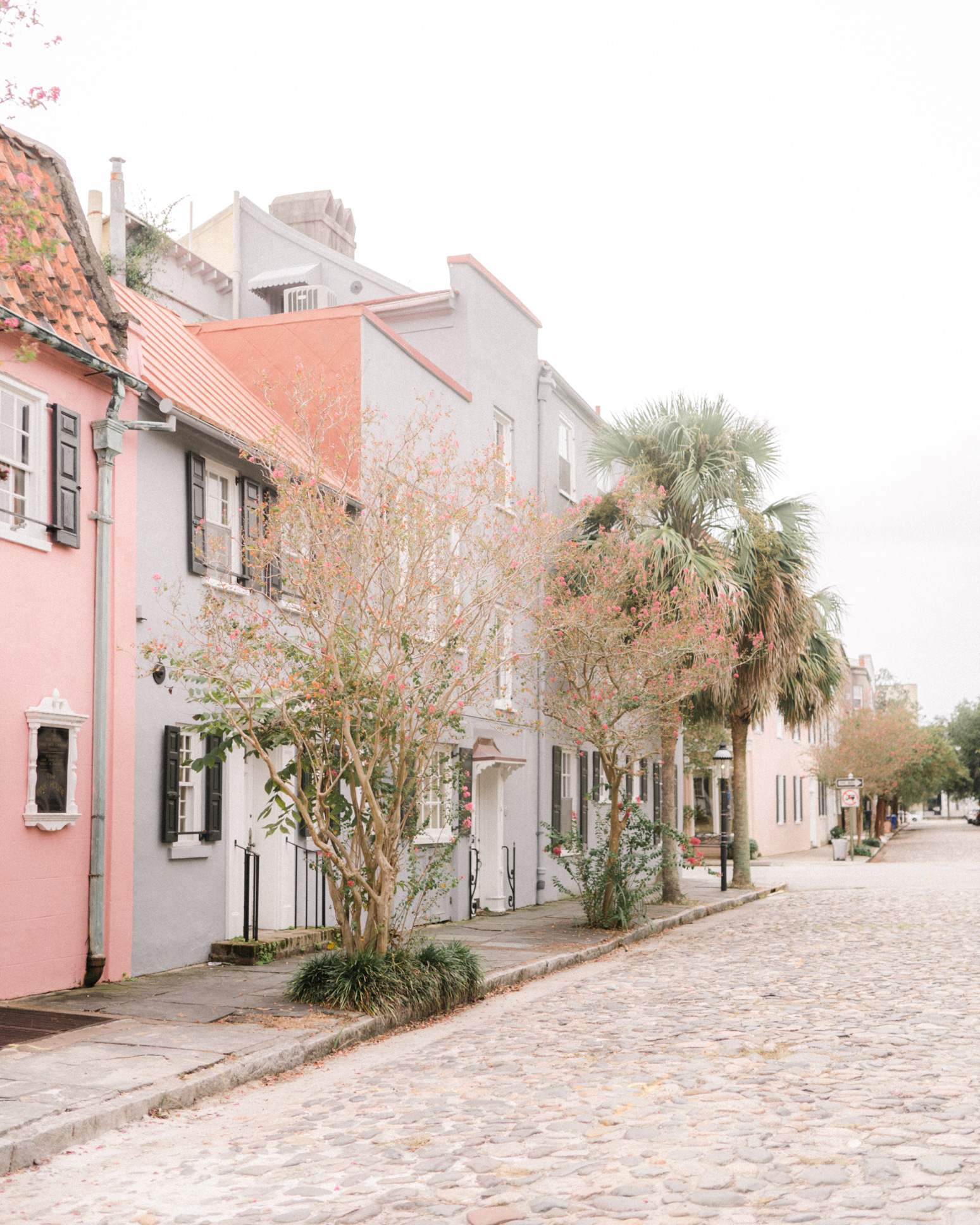 a close up of a street in front of a house