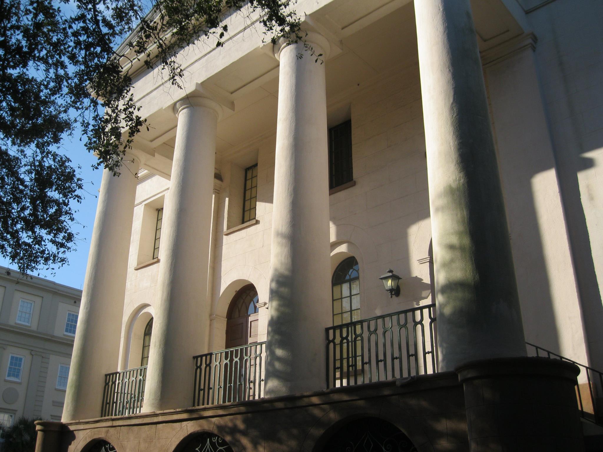 a group of people in front of a building