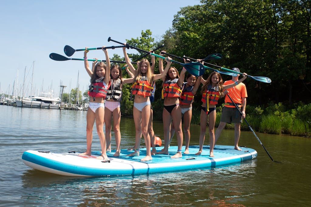 Birthday Party with 7 girls on one large Paddleboard and Instructor