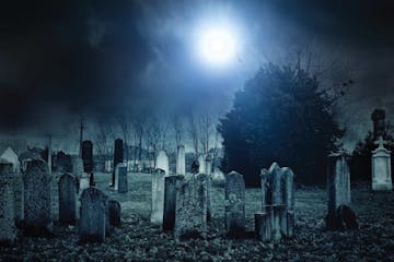 creepy photo of Galveston cemetery at night