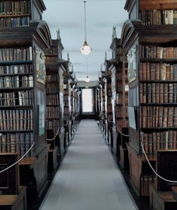 marsh's library - hall with old books on shelves either side
