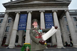 a man reading the proclomation outside the GPO