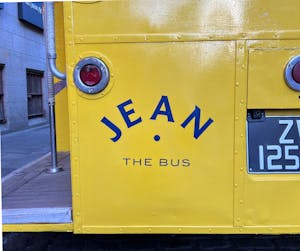 back of the bus says Jean