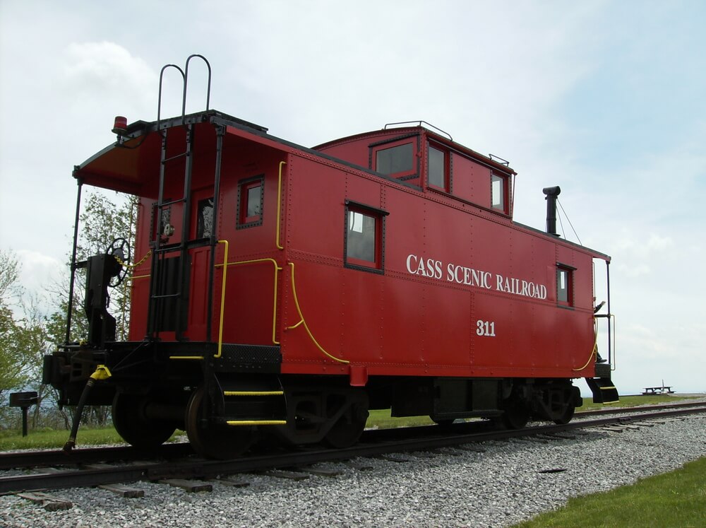 Cass Scenic Railroad car that is parked on a track.