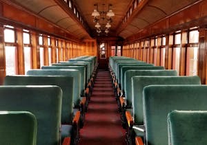 a large long train on a leather chair