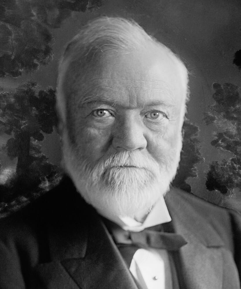 Old headshot of Andrew Carnegie wearing a suit and tie.