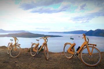 a bicycle is parked next to a body of water