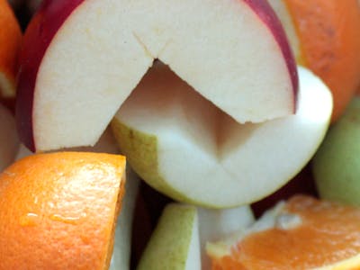 a close up of a slice of orange fruit