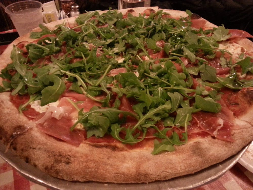 Lombardi prosciutto and arugula pizza