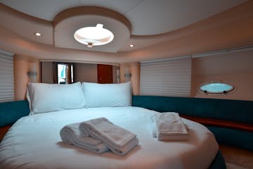 a bedroom with a large bed in a hotel room