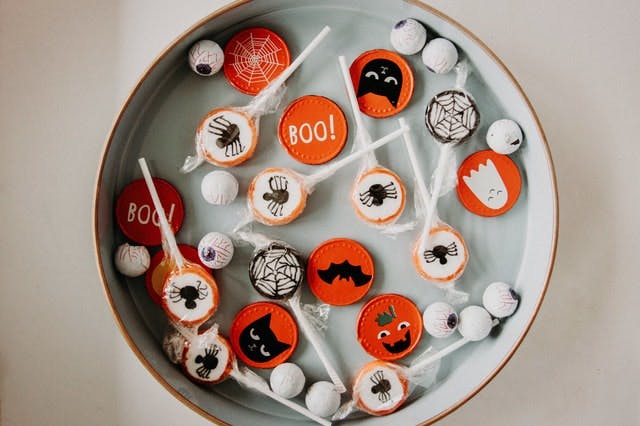 A plate filled with Halloween candy.
