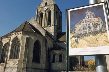 a sign in front of a church