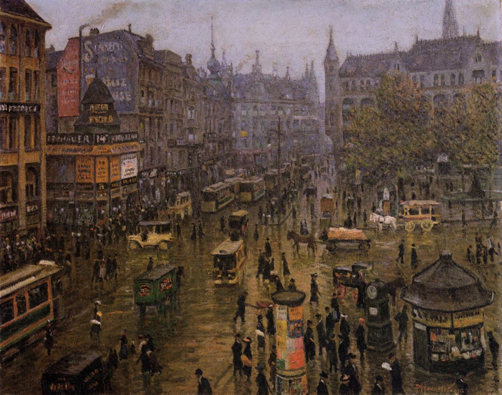 Heute ist der Spittelmarkt nahezu vollständig vom Verkehr vereinnahmt und von schmucklosen Hochhäusern umstanden. Auf dem Bild von Paul Hoeniger aus dem Jahr 1912 lassen sich zahlreiche Läden und Cafés erkennen.