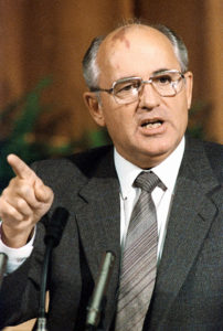Mikhail Gorbachev wearing a suit and tie