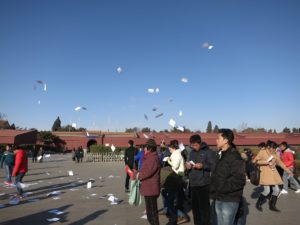 Pamphlet distribution at Tiananmen Square (CC BY 2.0: edward stojakovic from Portland, OR, United States) 