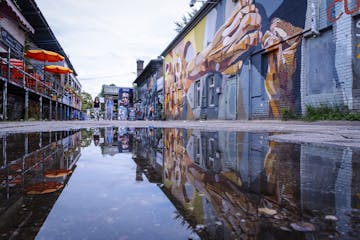 Reflection in a puddle on the RAW Gelände in Berlin Friedrichshain | Berlin on Bike Alternative tour