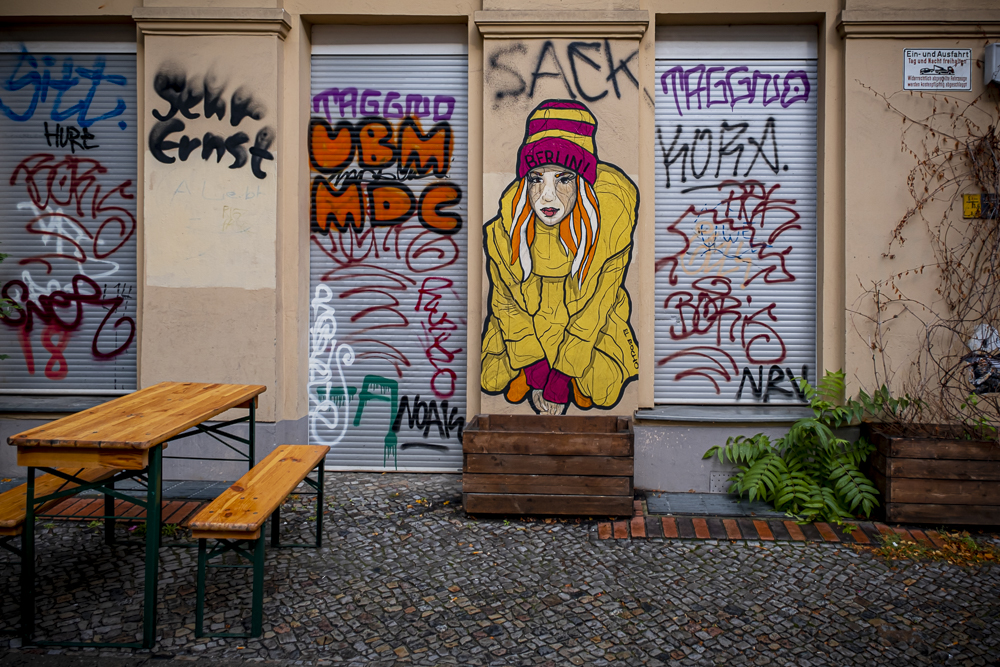 a graffiti covered wall