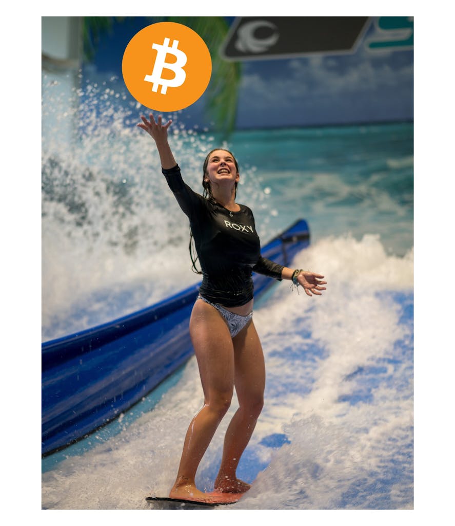 a woman jumping in the air with bitcoin logo