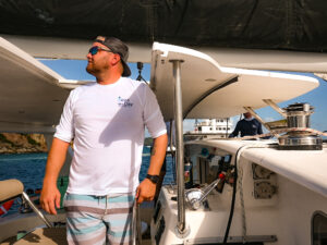 Seas the Day Charters USVI Captain Jason at the Helm of S/Y Leviathan