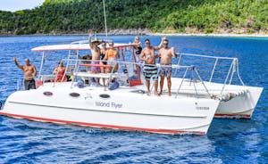 Guests aboard Seas the Day Charters USVI private charter boat M/V Island Flyer waving as they passed by