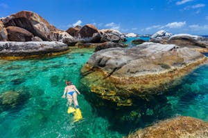 Snorkeler exploring the under water at the Baths in the BVI