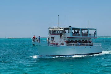 the southern star boat sailing the emerald coast taking people on a dolphin cruise