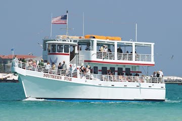 the Southern Star glass bottom boat bringing people on a Destin dolphin cruise