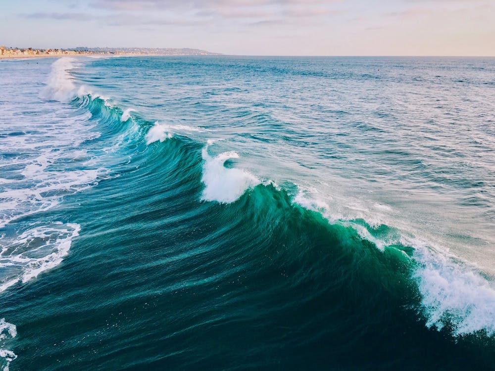 a person riding a wave in the ocean