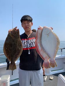 Shosei Koda holding a fish