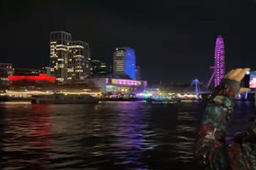 a boat that is lit up at night