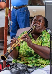 a woman playing the clarinet