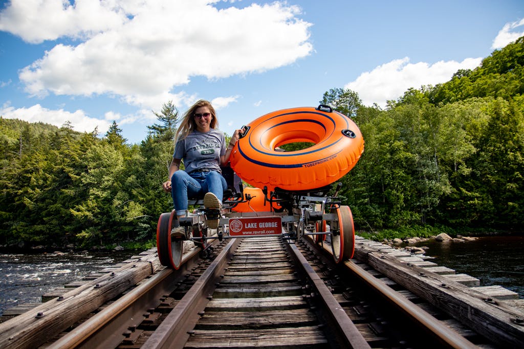 a person sitting on a train track