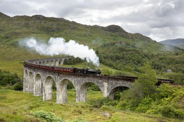 a train traveling over a bridge