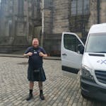 Scottish Guide ready to go on tour in kilt