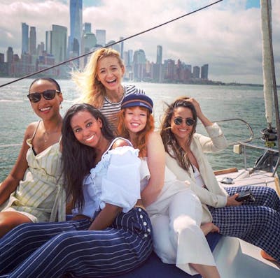 Friends on a sailboat around Manhattan