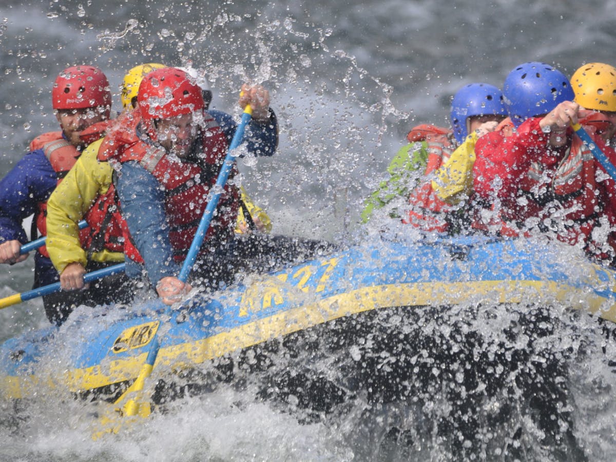 a group of people whitewater rafting in washington on the wenatchee river
