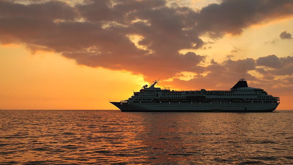 Cruise Ship And Sunset
