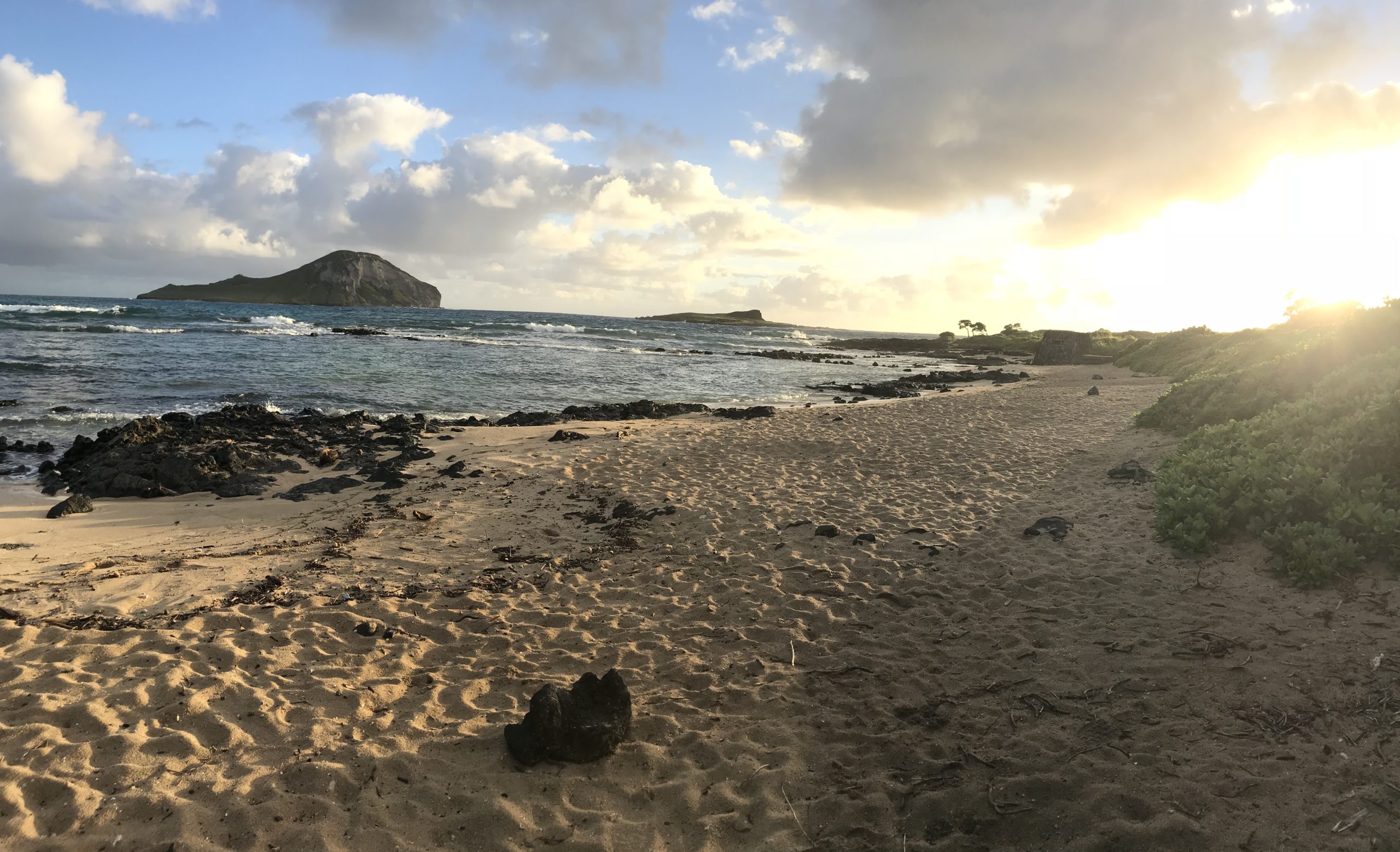 Baby Makapuu Tidepools with the sun rising, taken before the beach clean up started