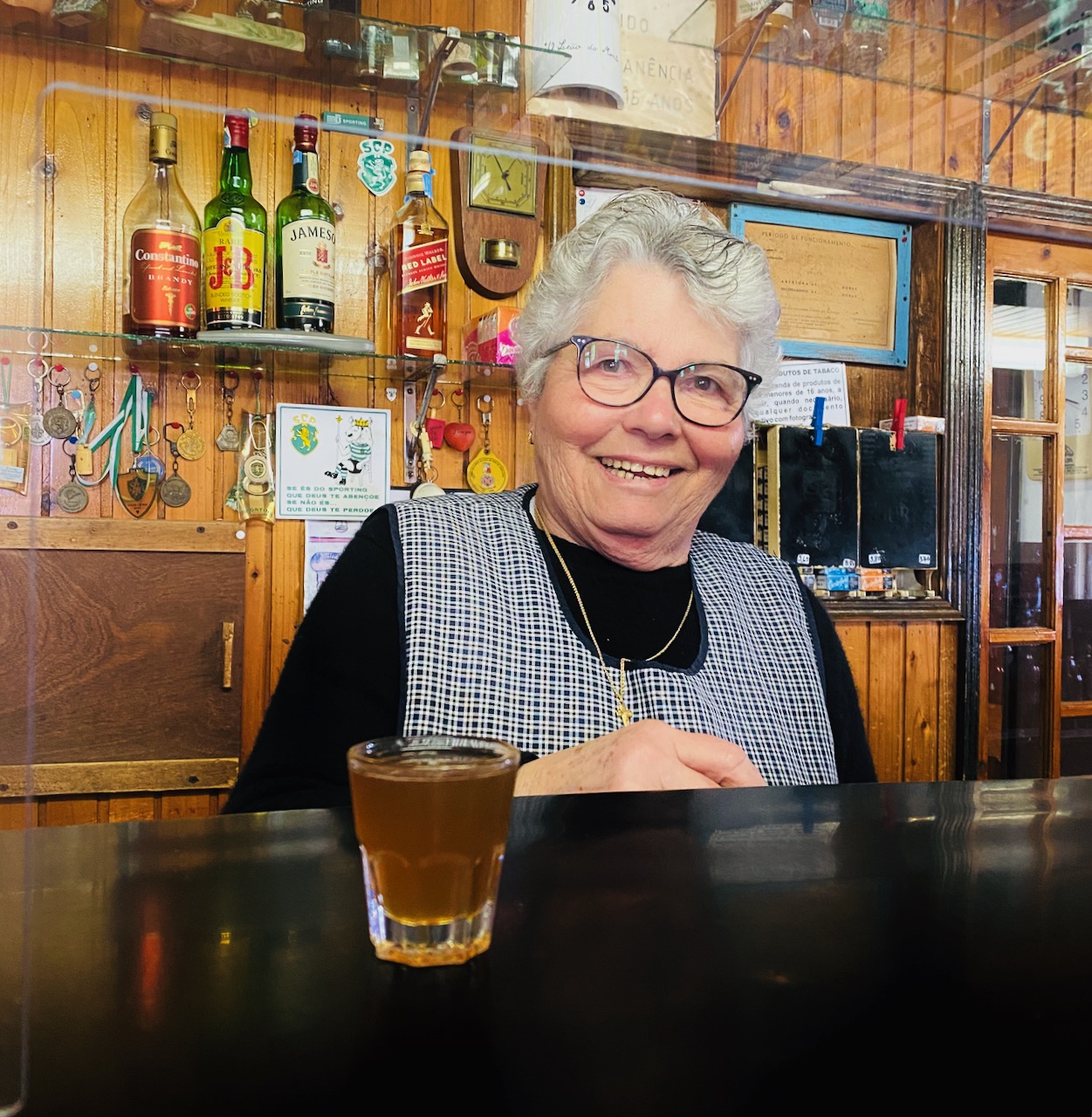 a person sitting at a table in a restaurant