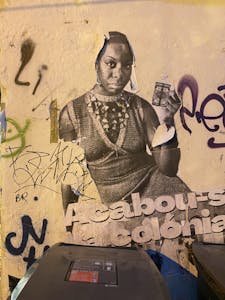 an old photo of Nina Simone on a wall in Lisbon