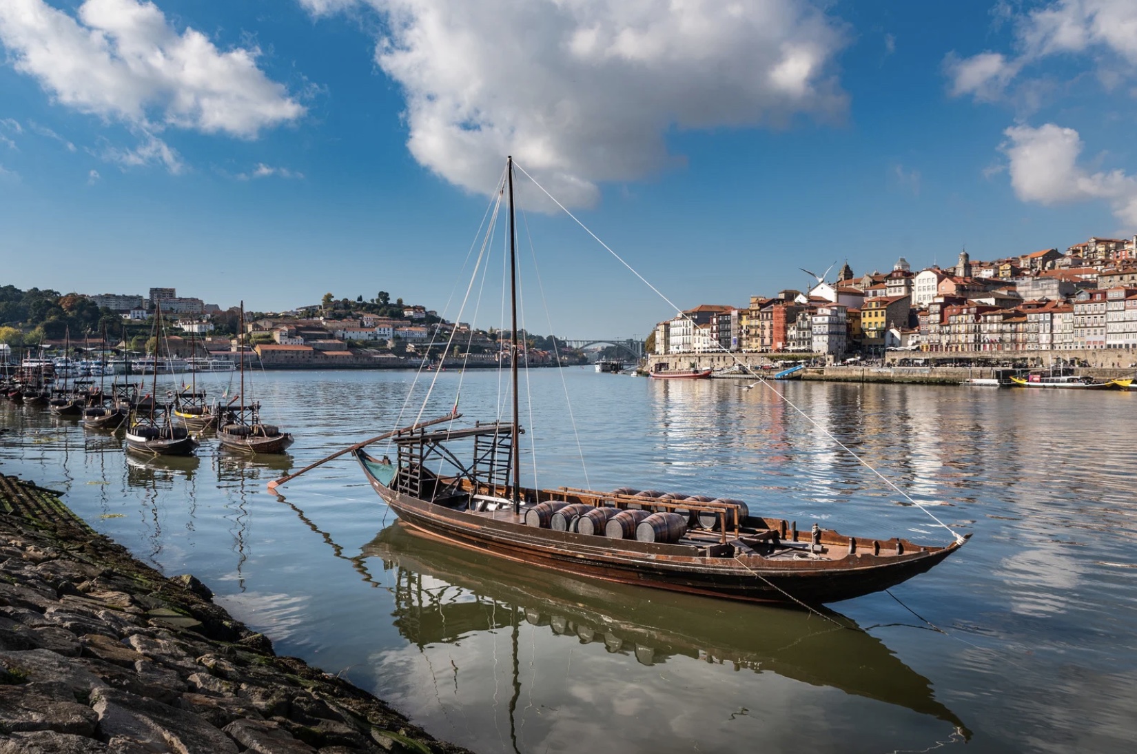 a rebelo boat is docked next to a body of water