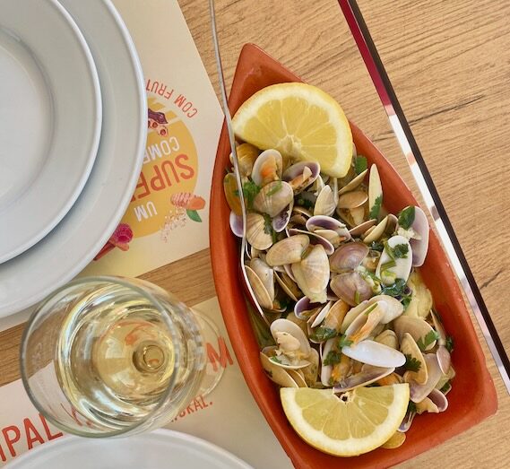 a bowl of food on a plate on a table