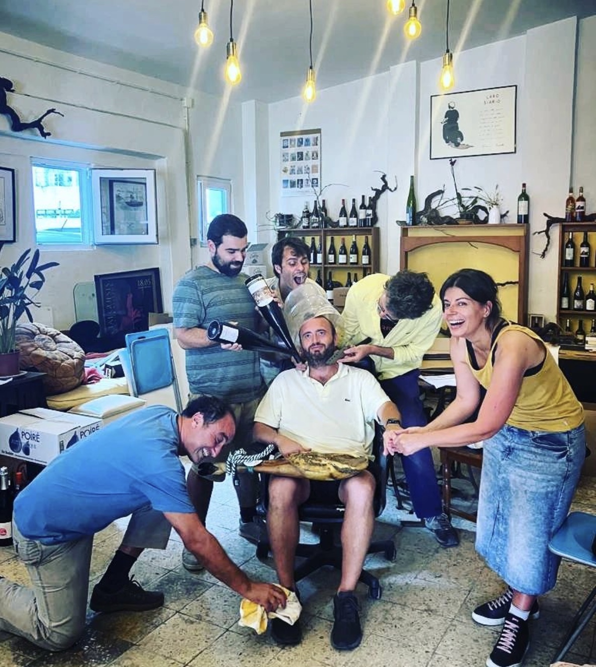 a group of people sitting in a room