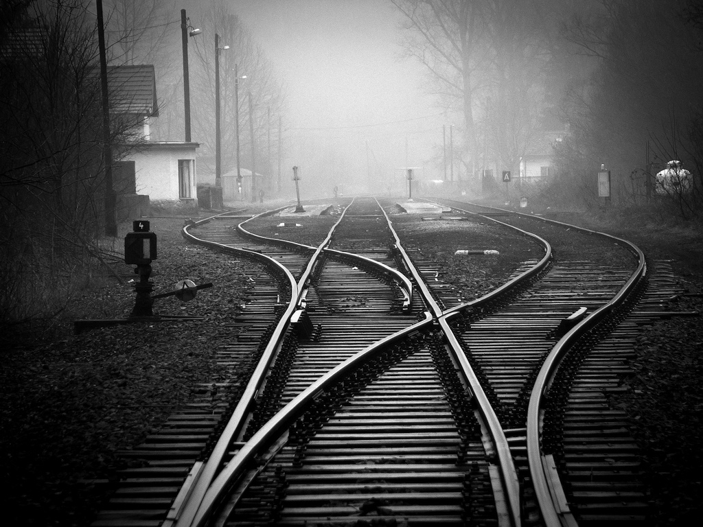 a b&w picture of train tracks