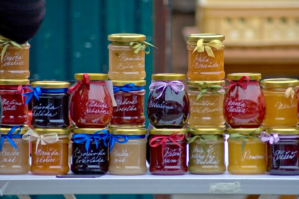 a selection of home-made marmalades at a farmers market in Prague