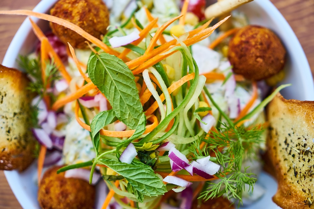 a delicious looking falafel salad that you can try on the Vegefest in Prague