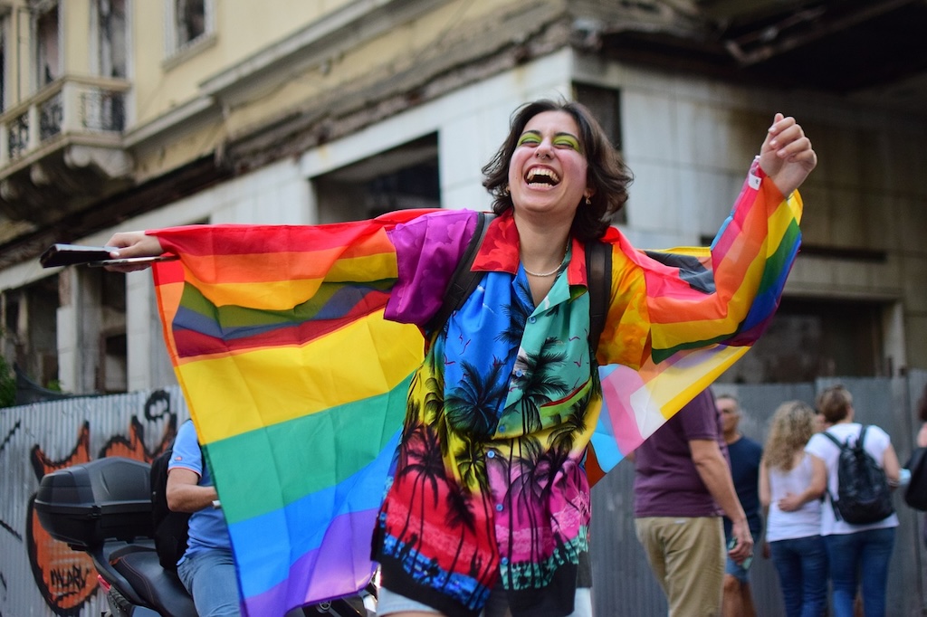 a person dressed in rainbow colors for Prague Pride